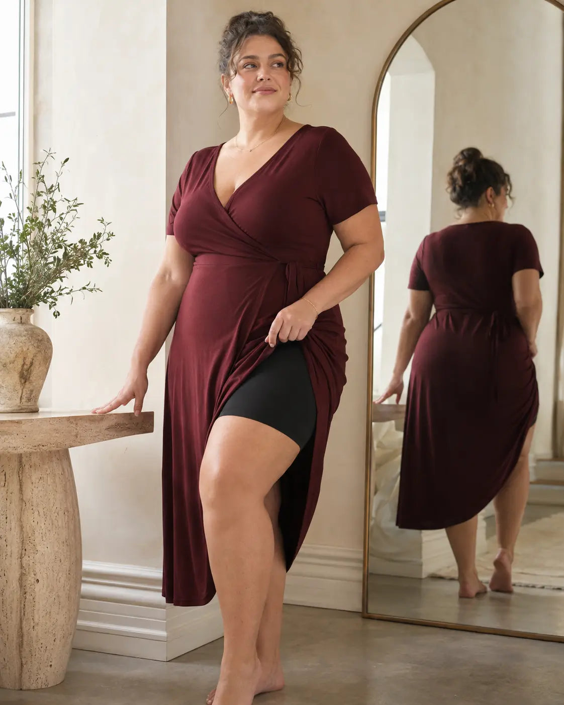 Black LYROVA shorts worn discreetly under a dress